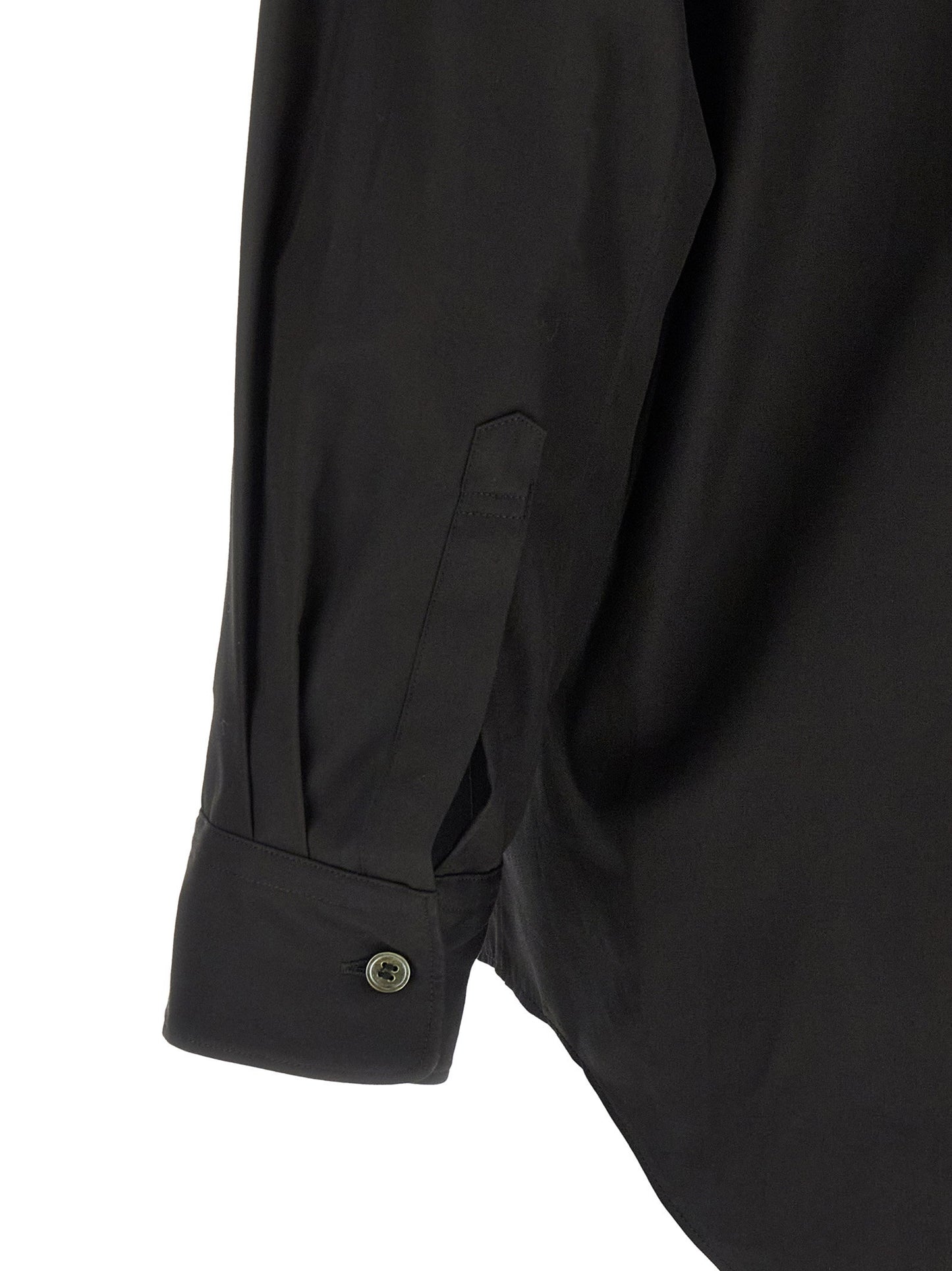 قميص Comme Des Garçons Homme Plus بقصات هندسية