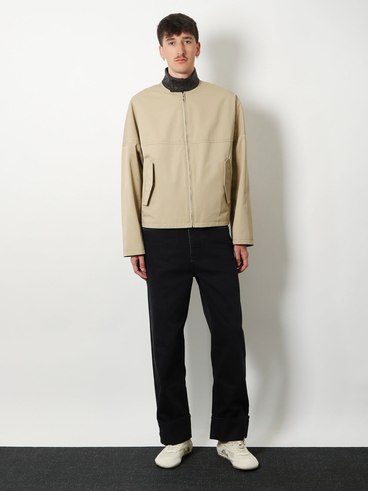 Black denim trousers