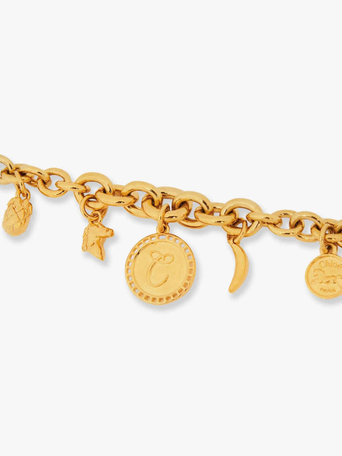 Brass bracelet with charms