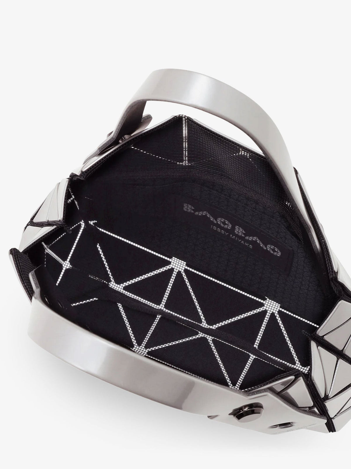 Carat handbag with geometric inserts