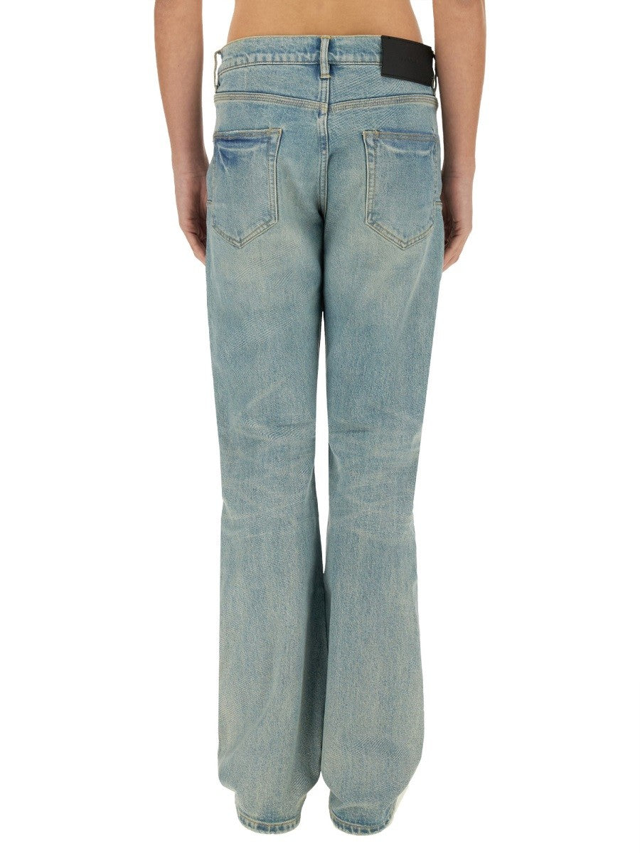 "COATED FLARE" JEANS
