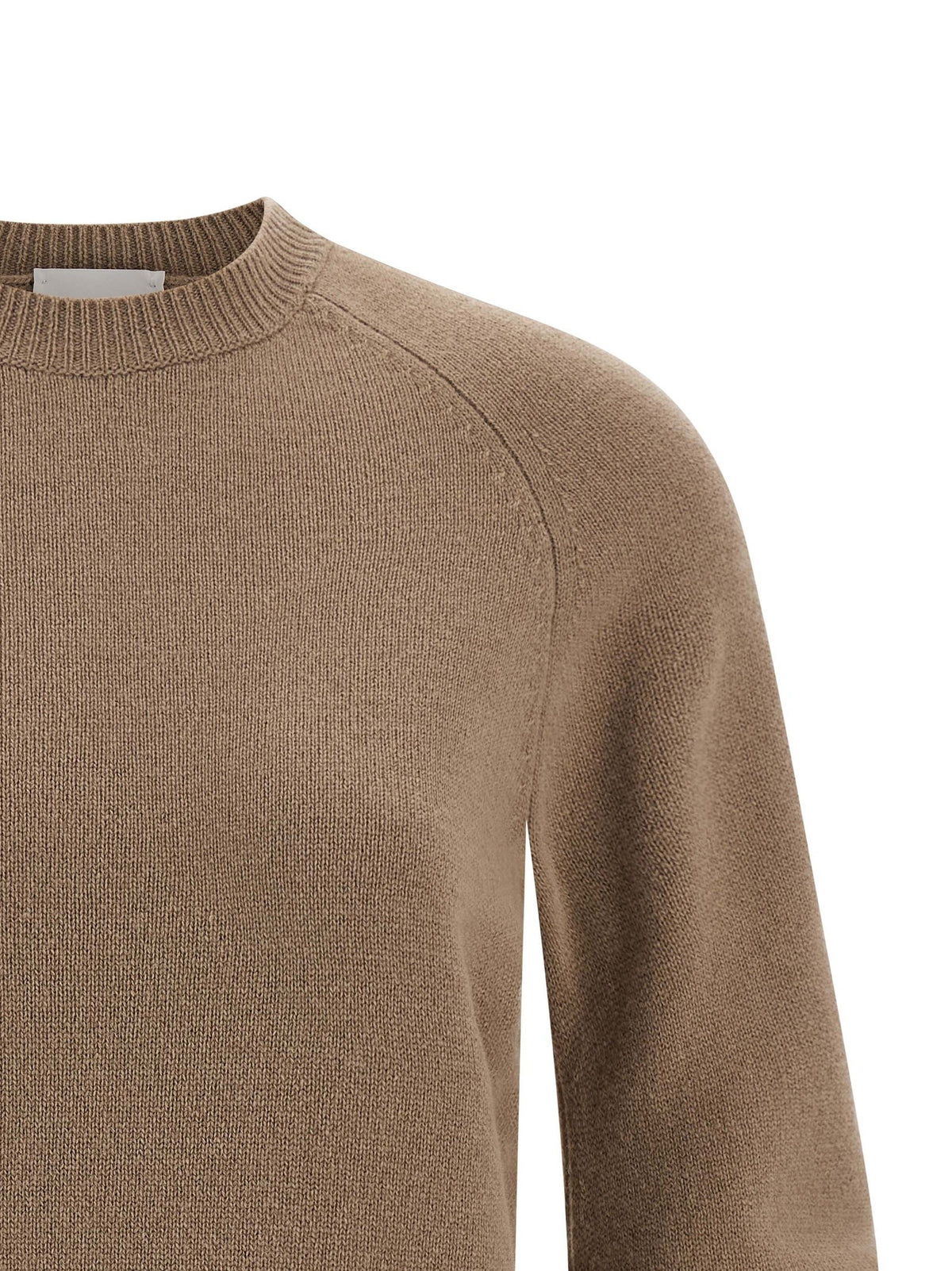 Curved sleeve sweater