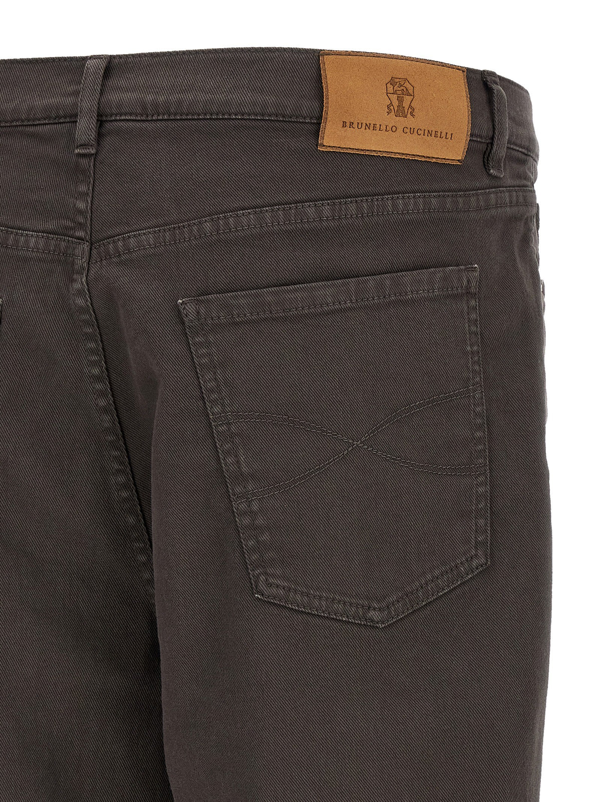 Garment-dyed denim jeans