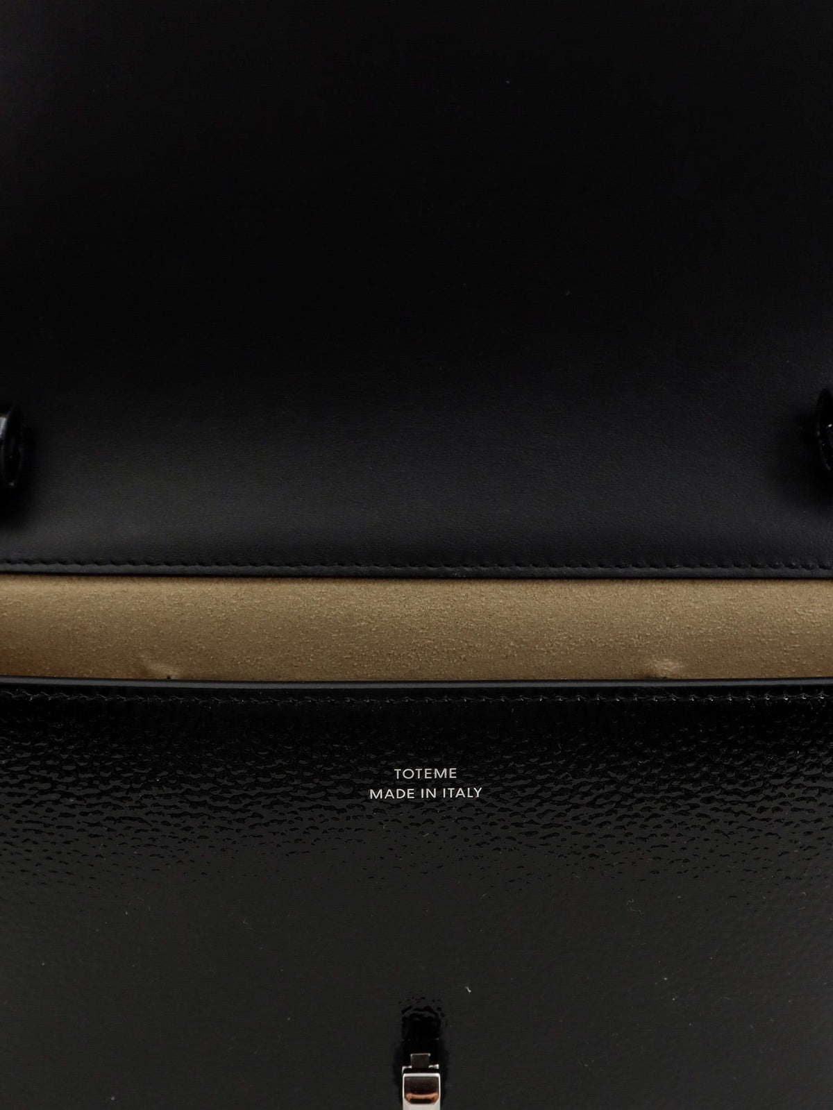 Patent T-Lock crossbody bag