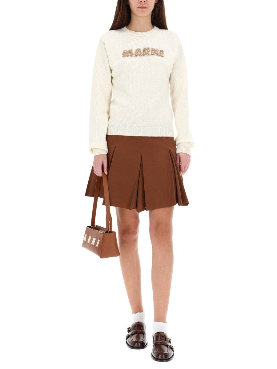 PLEATED MINISKIRT