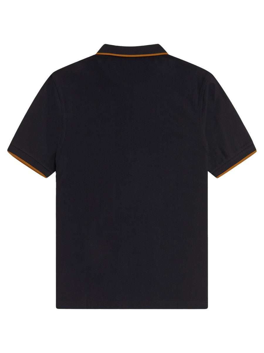 POLO CON ZIP E LOGO