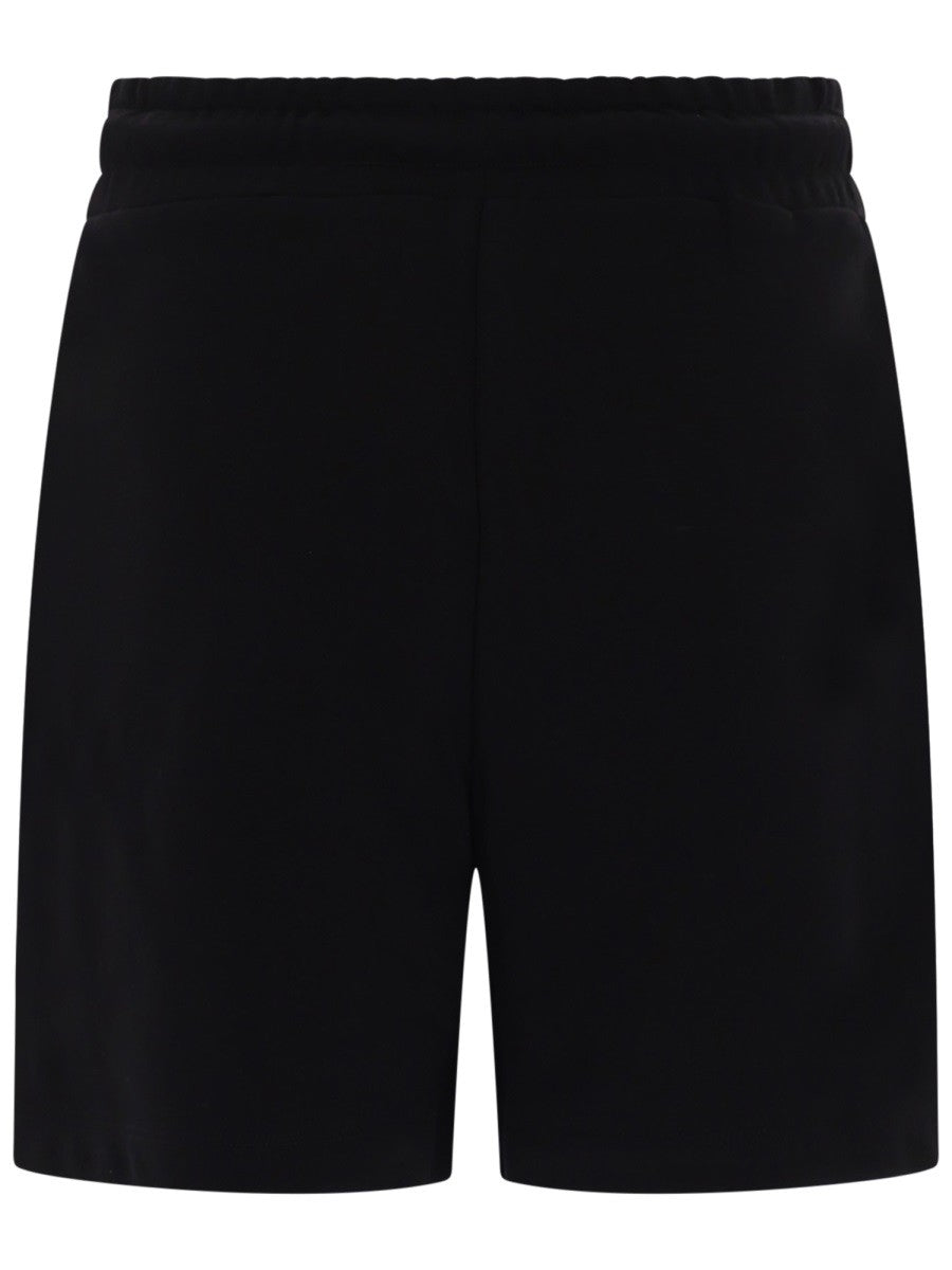 SHORTS CON LOGO