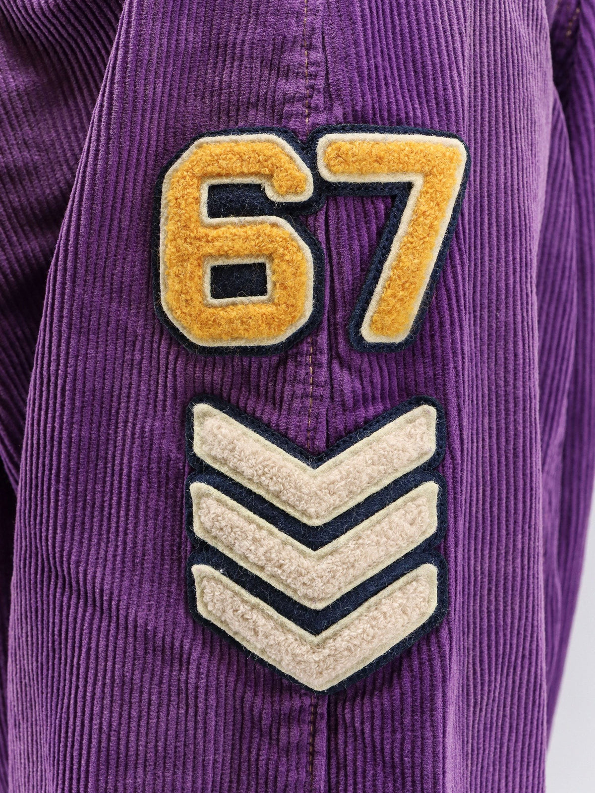 Velvet jacket with flocked logo patch
