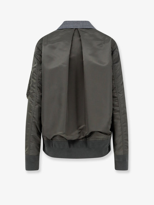 Wool blazer with nylon sleeves
