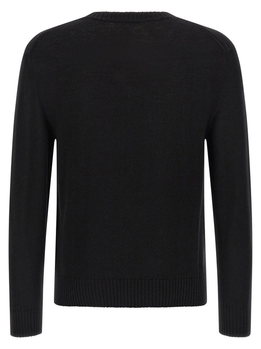 كنزة Jil Sander مطرّزة بالشعار
