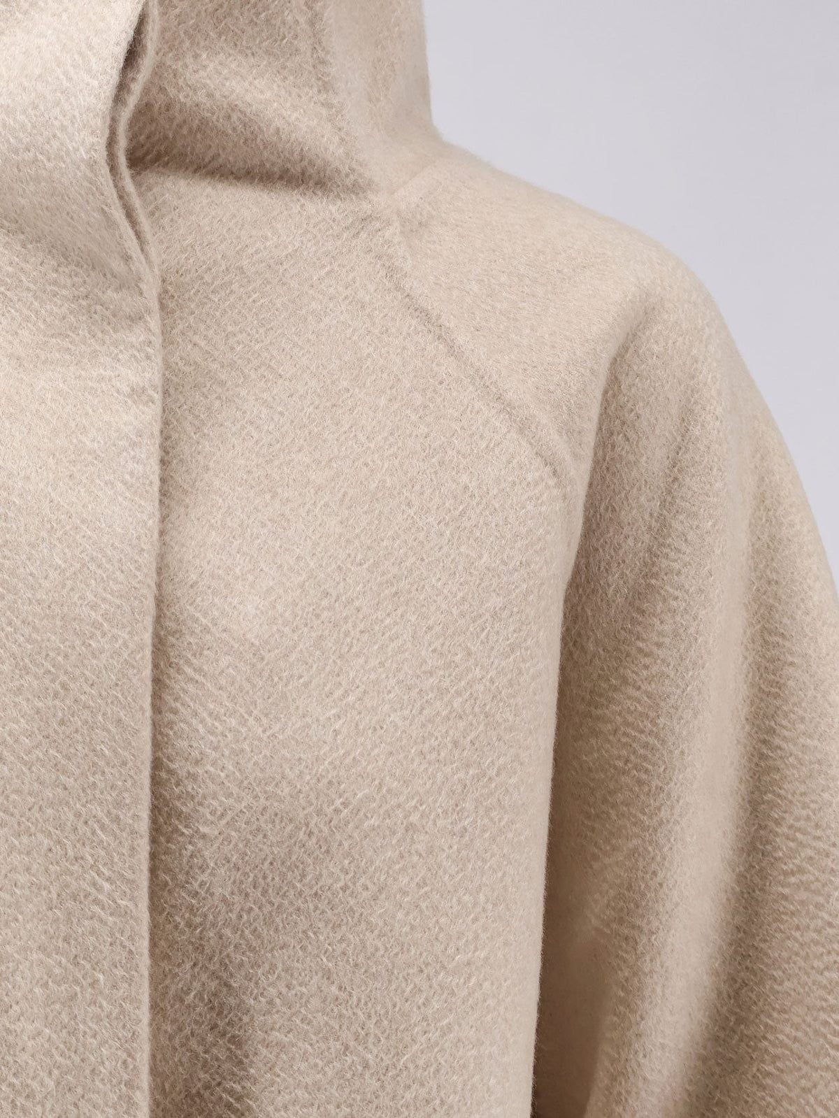 Asymmetrical cashmere coat
