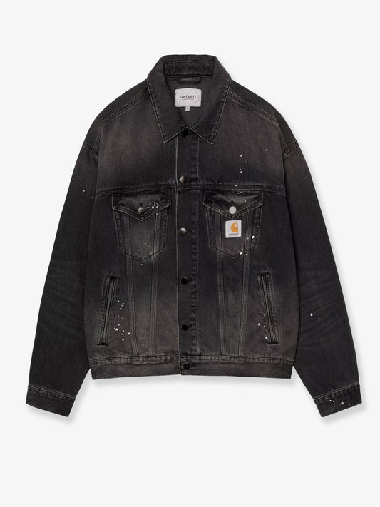 Black denim jacket with a distressed effect