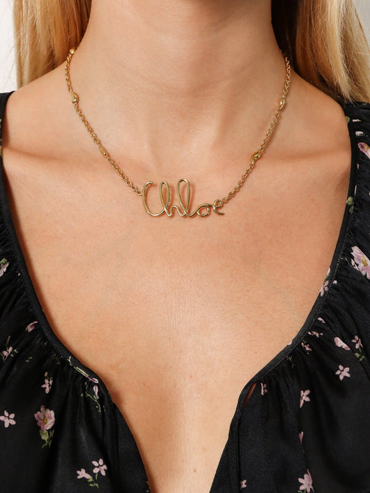 Brass necklace with lettering logo