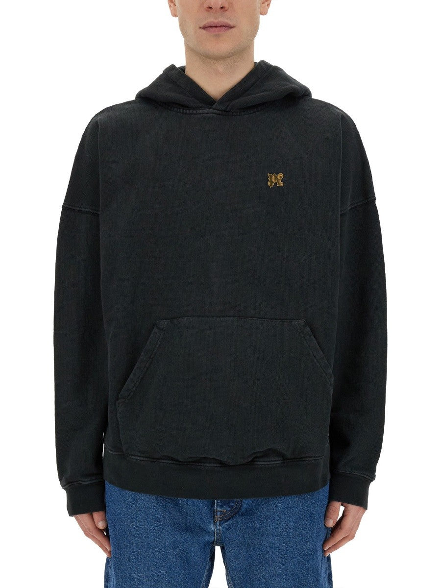 سويت شيرت بطبعة "BURNING MONOGRAM"