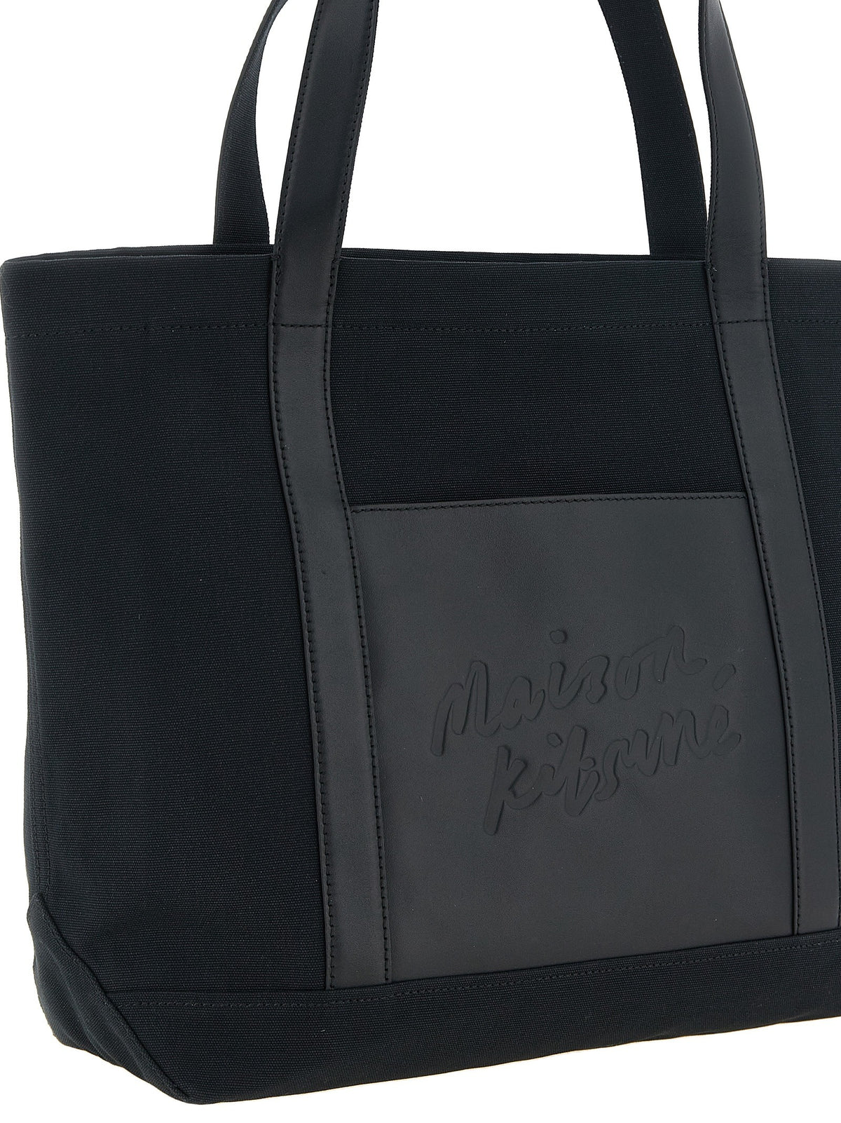 Canvas and large leather shopping bag