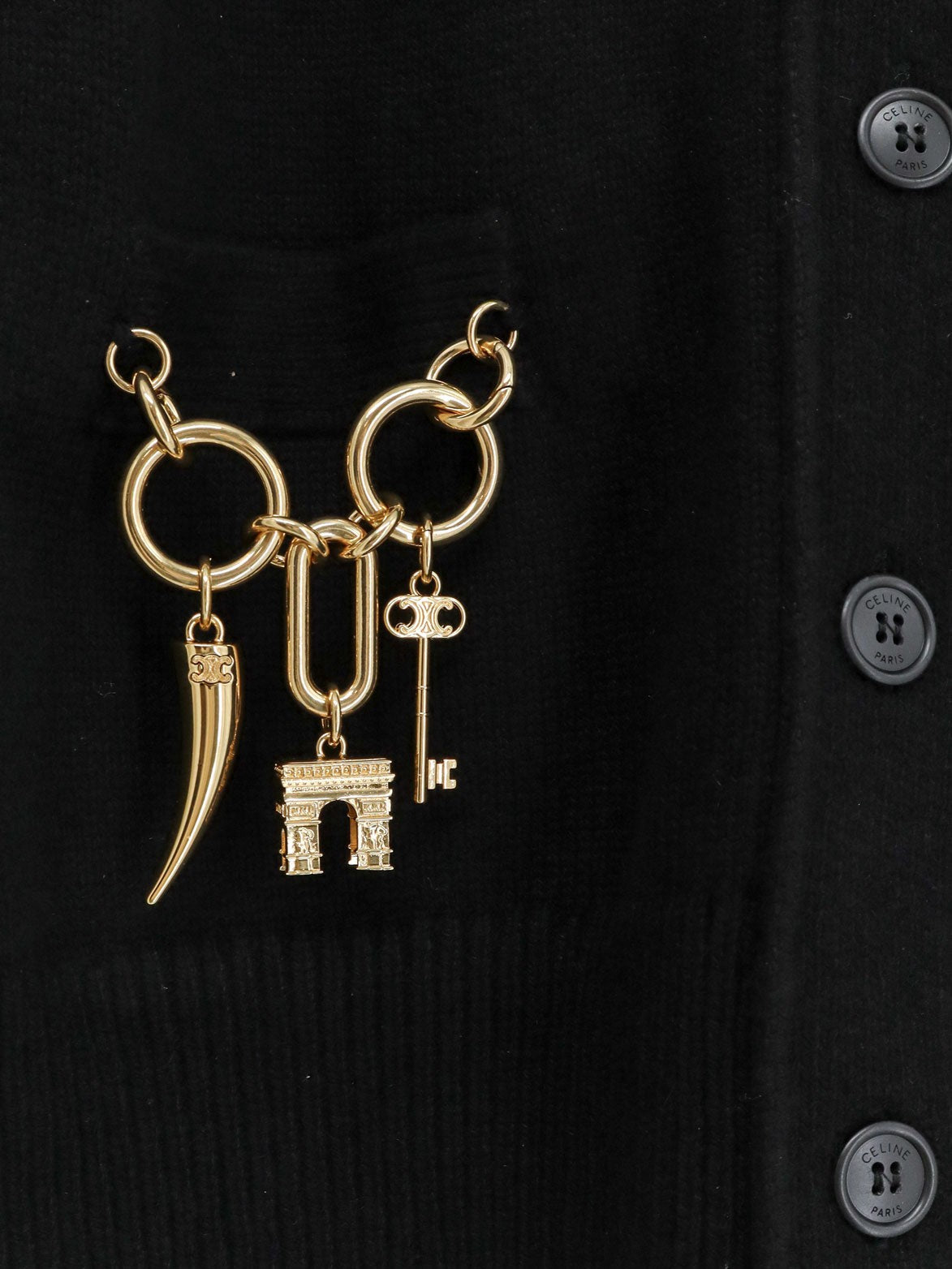 Cashmere cardigan with gold metal charms