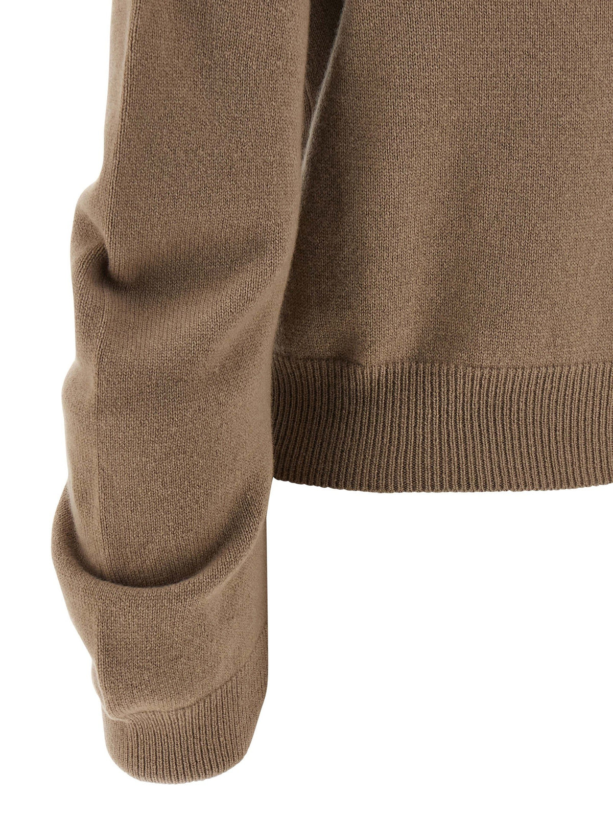Curved sleeve sweater