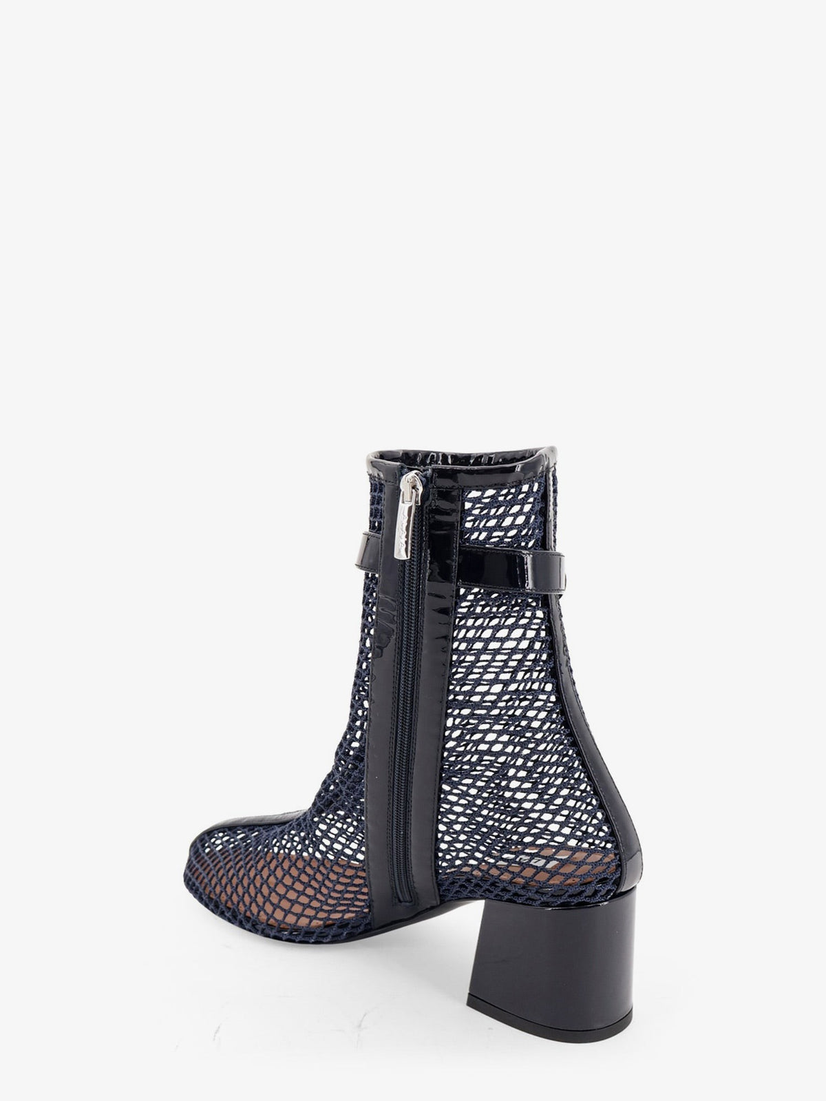 Fishnet 55 mesh and patent leather boots