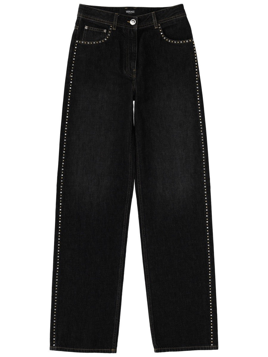 JEANS WITH STUDS AND CRYSTALS DECORATION