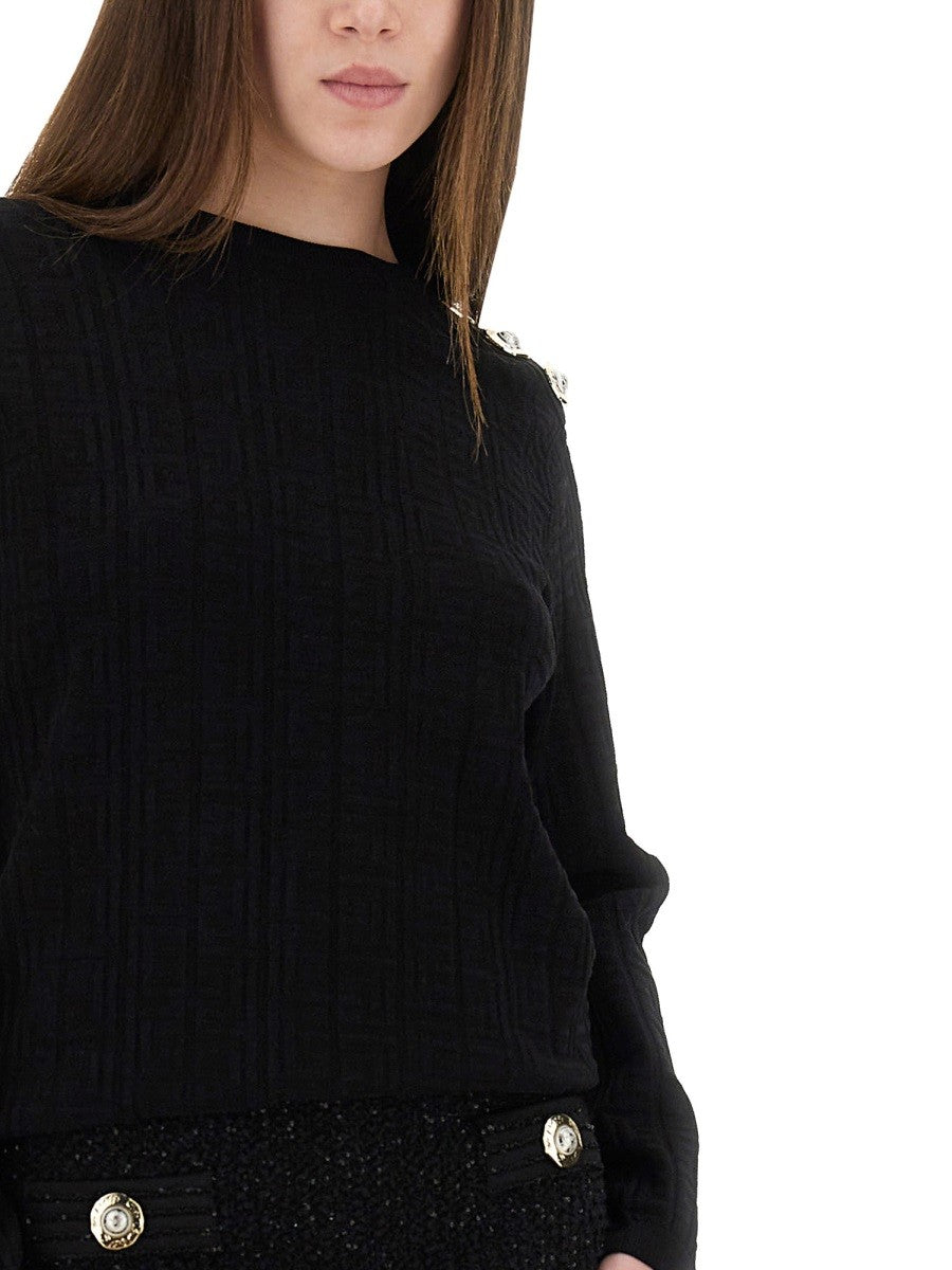 KNITTED TOPS.