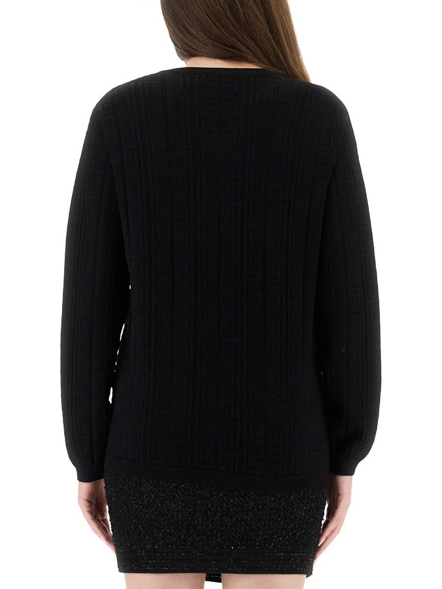KNITTED TOPS.