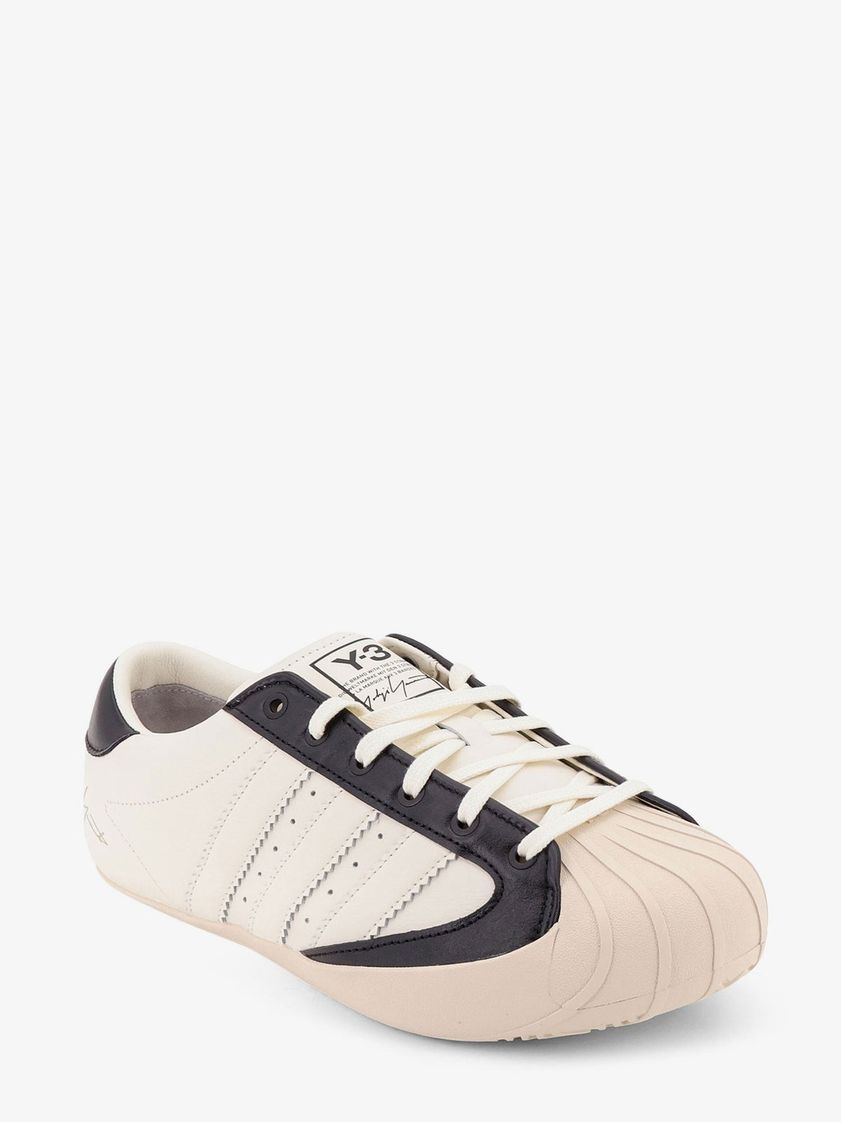 Leather and rubber sneakers