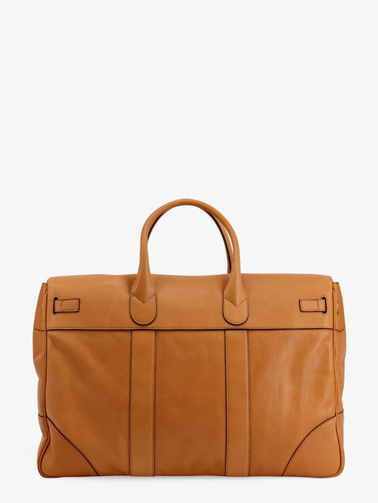 Leather travel bag with engraved logo on the front
