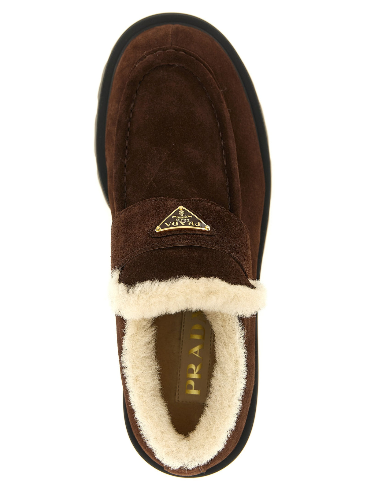 Loafers with fur and enamel logo