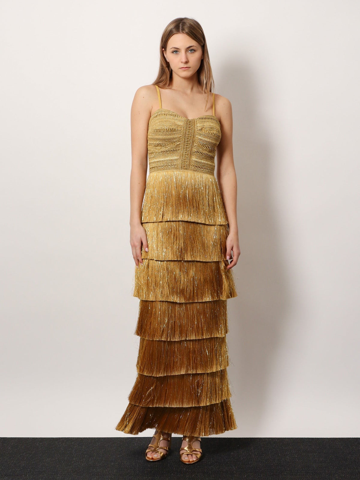 Long dress with embroidered courset and fringes
