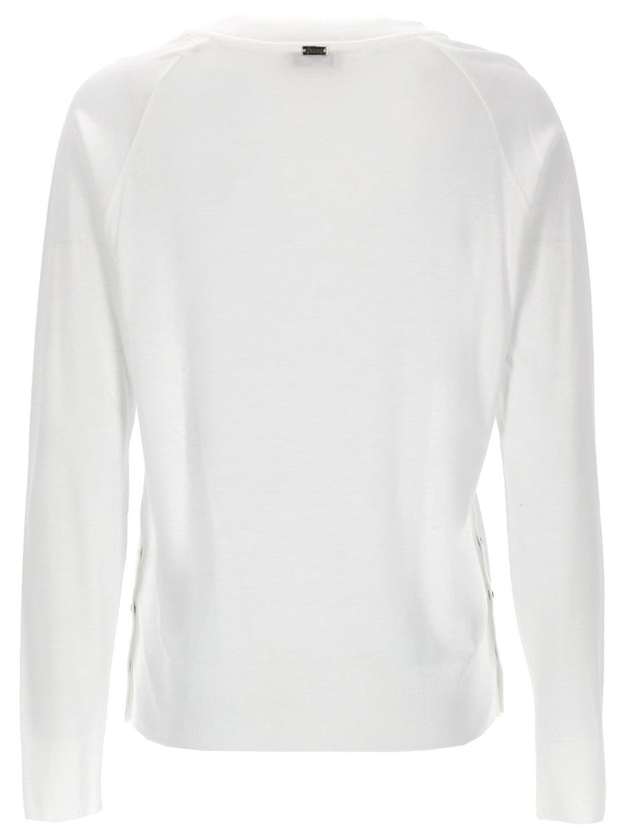 MAGLIA CON BOTTONI LATERALI