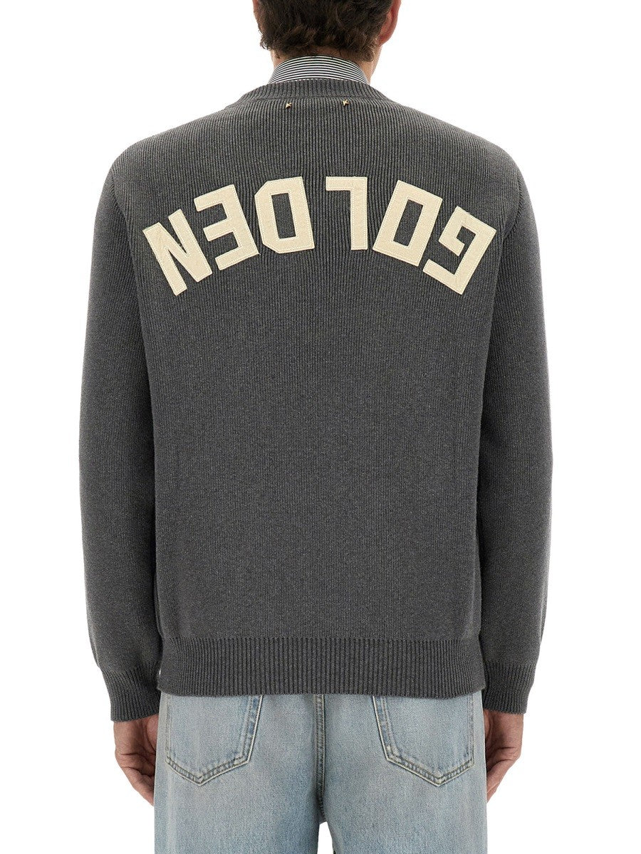 MAGLIONE CON SCRITTA SUL RETRO