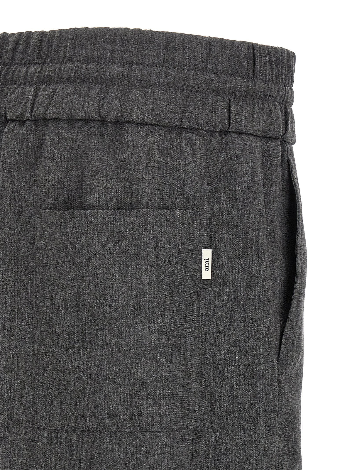 Virgin wool trousers with elastic