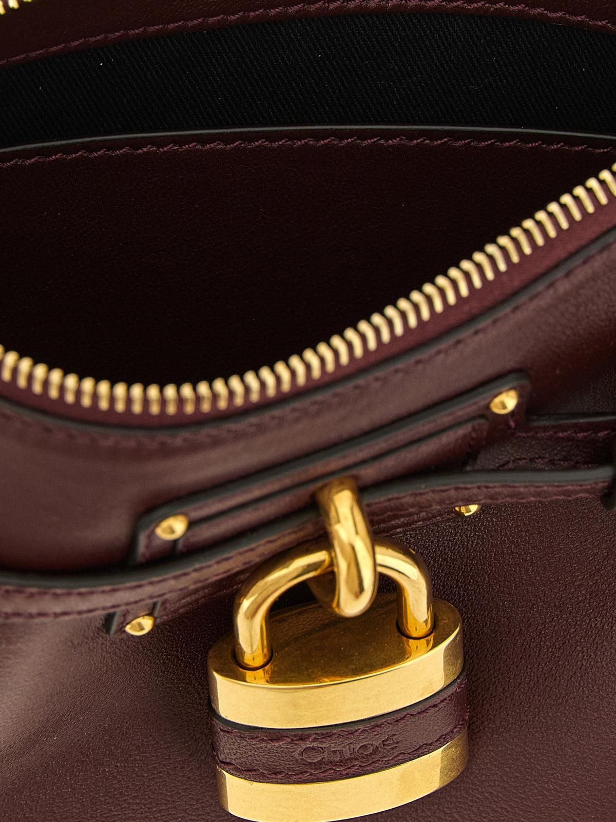 'Paddington Sling' burgundy mini clutch