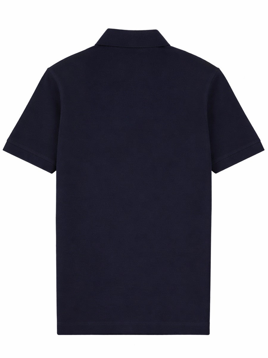 POLO CON PATCH LOGO