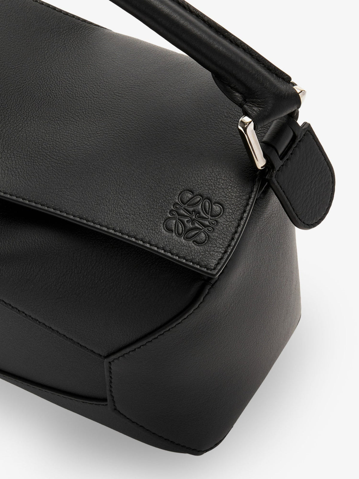 Puzzle Edge leather handbag with engraved Anagram logo