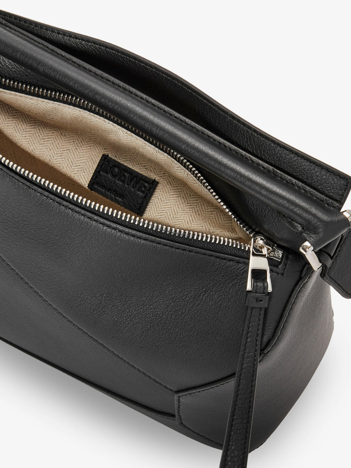 Puzzle Edge leather handbag with engraved Anagram logo
