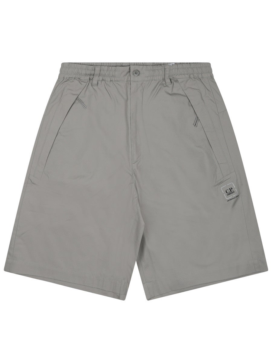 SHORTS "METROPOLIS" CON LOGO