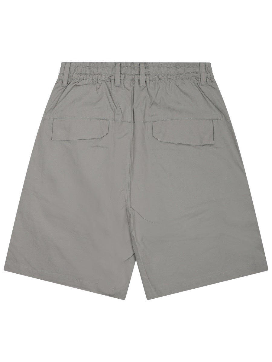 SHORTS "METROPOLIS" CON LOGO