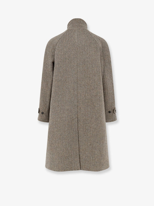 Single-breasted wool coat with a herringbone pattern