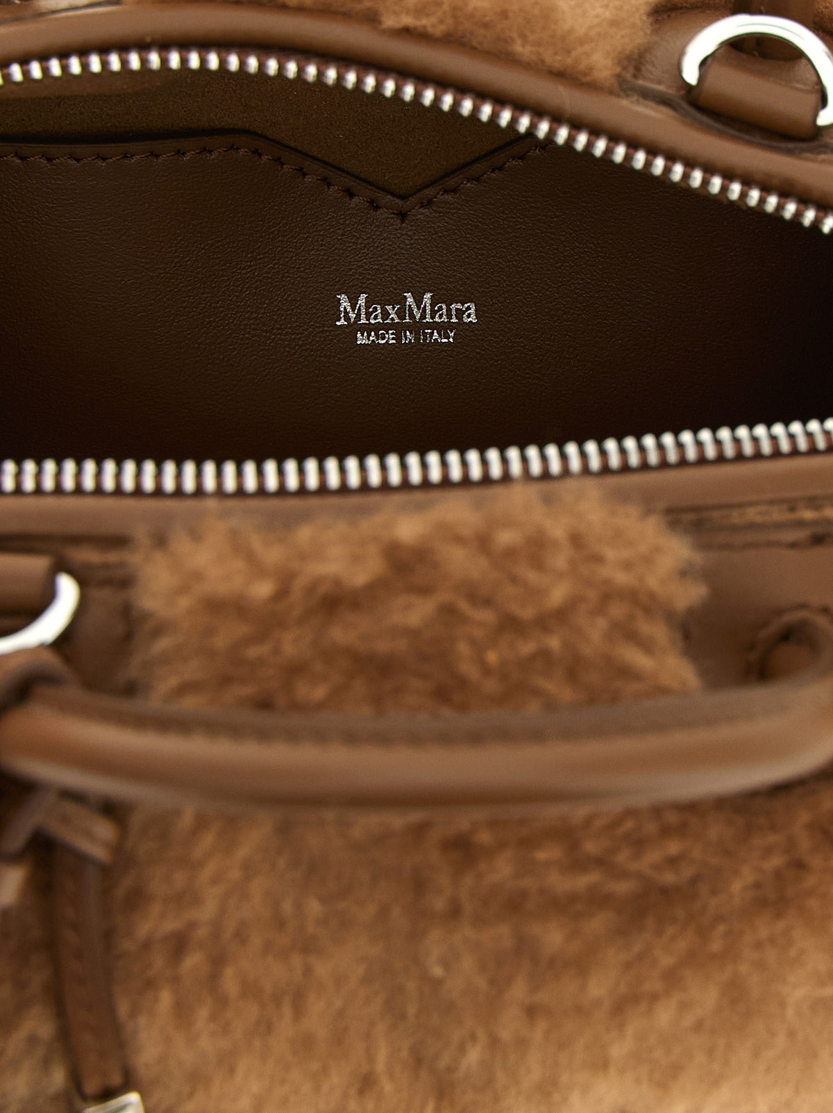 Small beige 'Teddy Holdals' top case