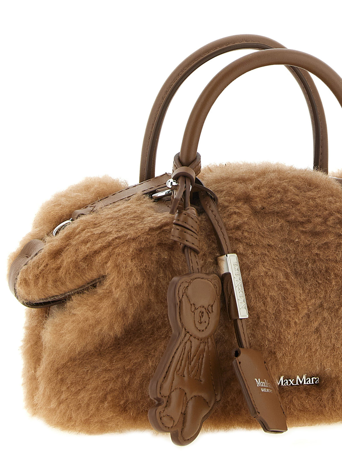 Small beige 'Teddy Holdals' top case