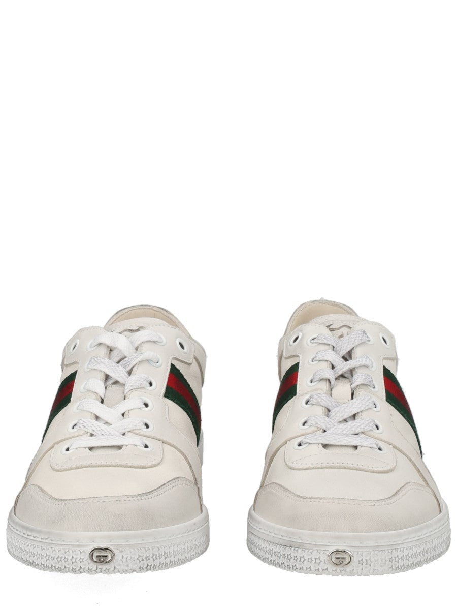"STRETCH" LEATHER EFFECT SNEAKER