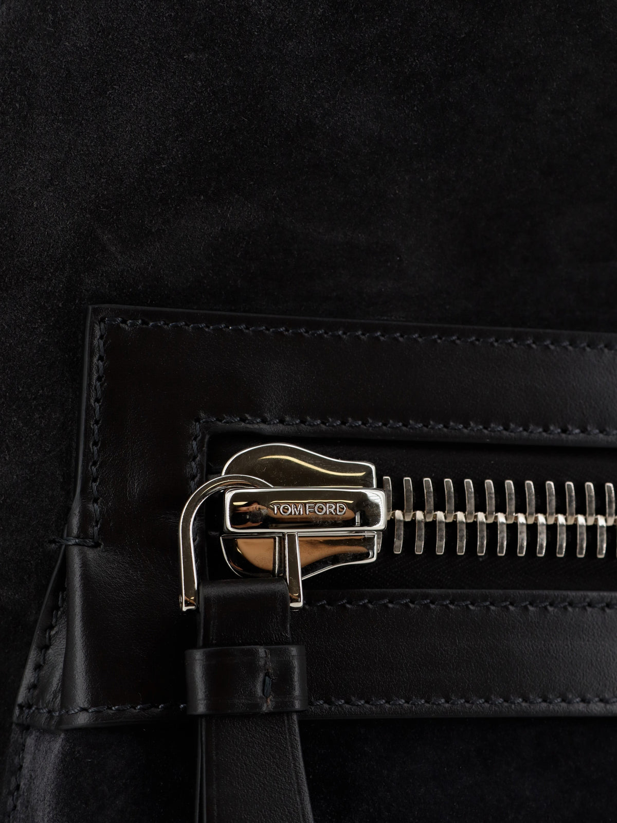 Suede backpack with maxi zip on the front