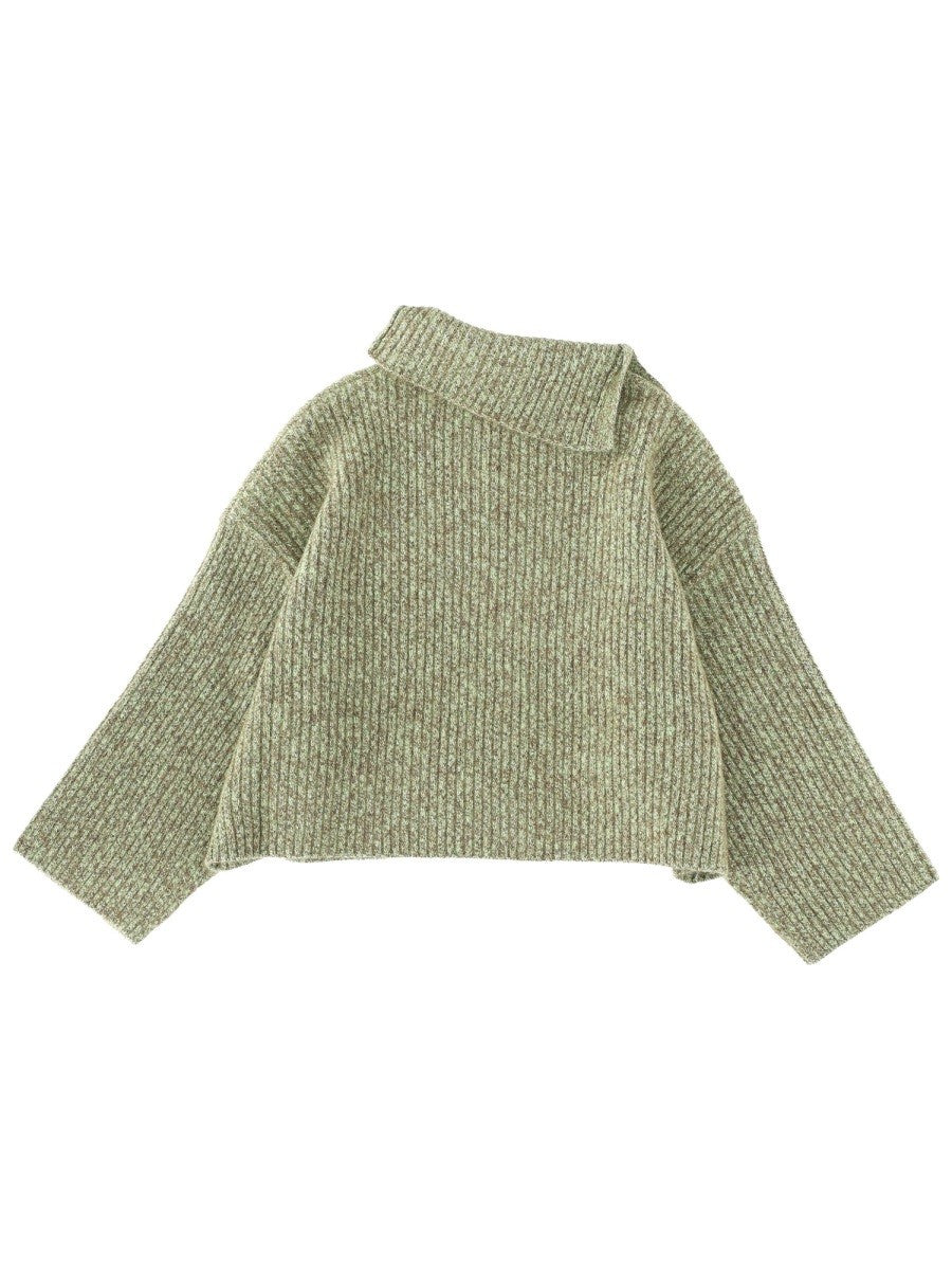 SWEATER WITH SIDE BUTTON CLOSURE