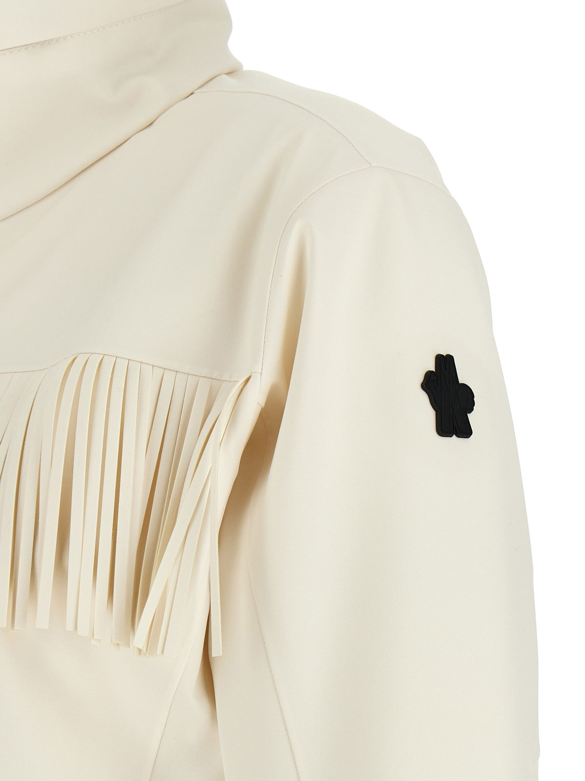 White fringed ski suit