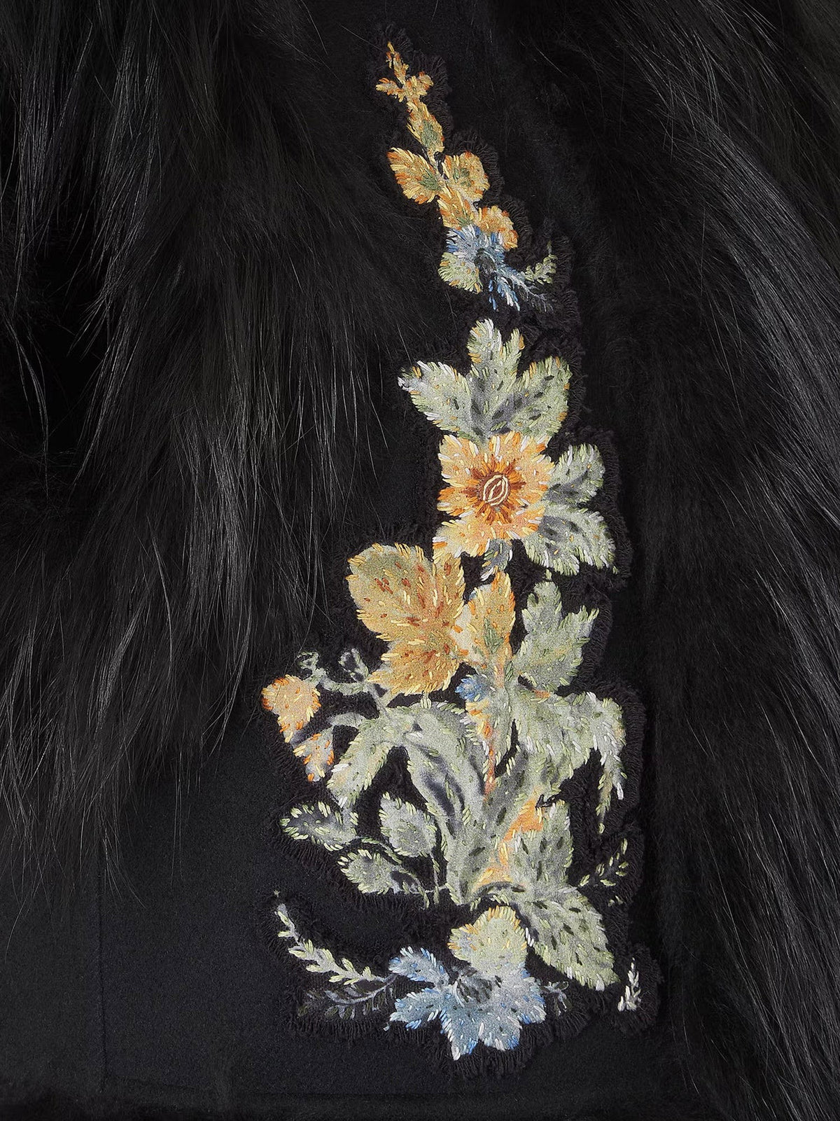 Wool vest with floral embroidery and fox fur trim