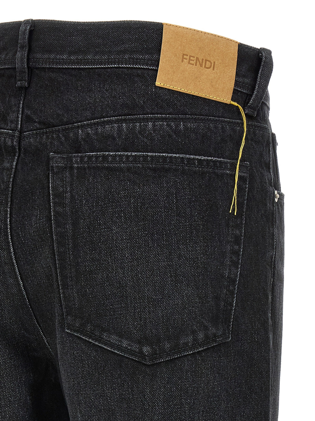 Yellow stitching jeans with visible thread