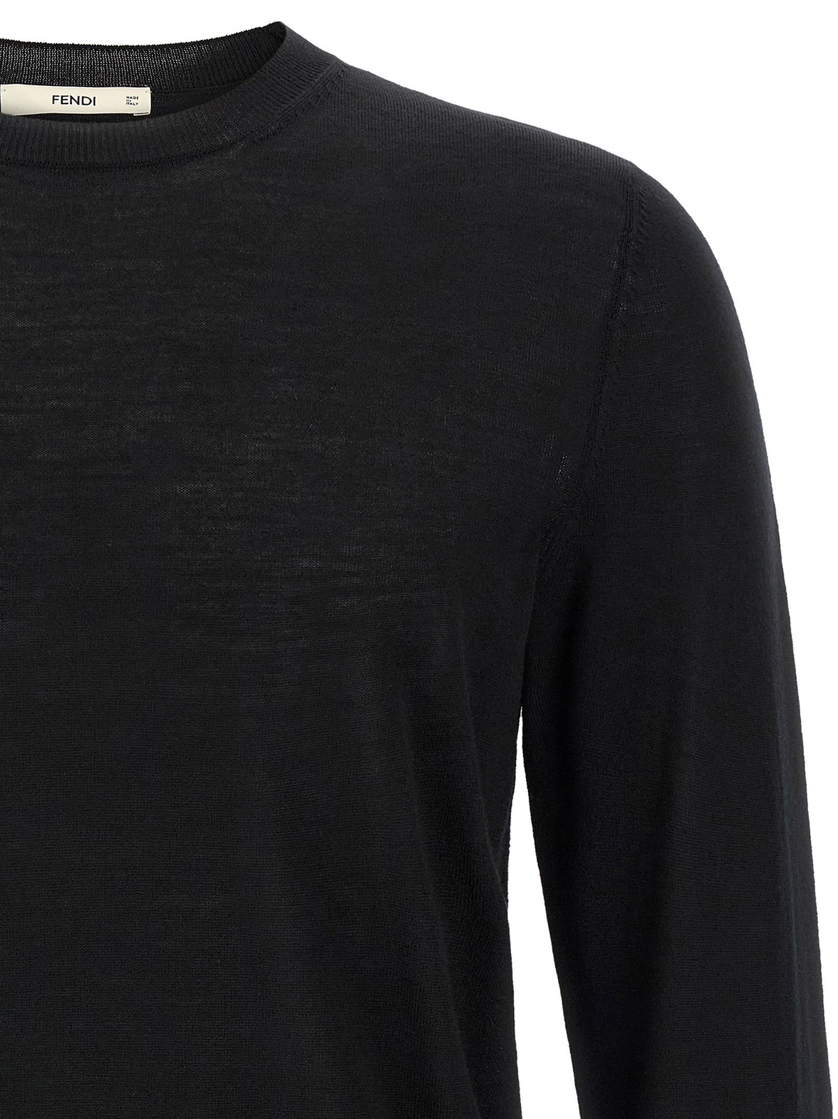 Yellow stitching sweater with visible thread